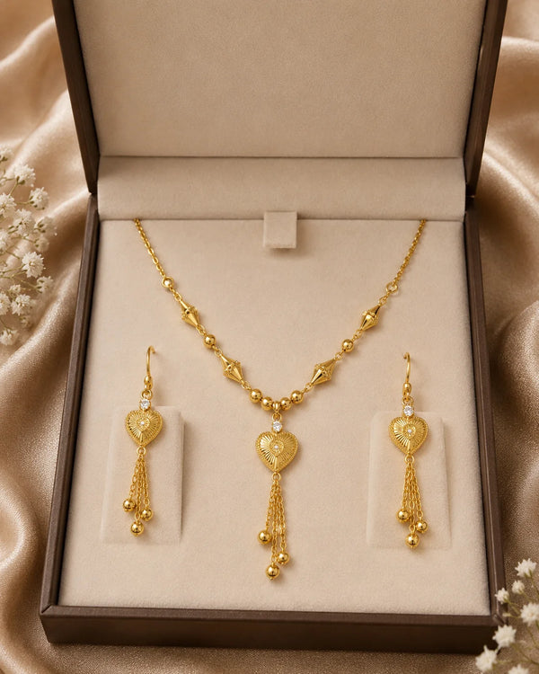 Gold Heart Pendant Jewelry Set – Elegant Necklace & Matching Tassel Earrings