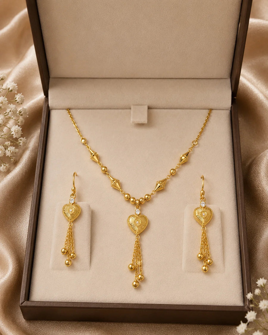 Gold Heart Pendant Jewelry Set – Elegant Necklace & Matching Tassel Earrings